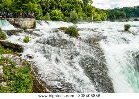Neuhausen Am Rheinfall, Switzerland - 23 July 2019. Waterfall On The River Rhine In The City Neuhaus