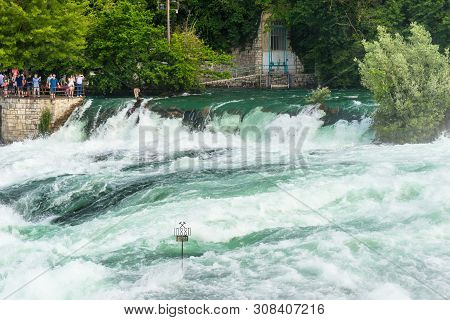 Neuhausen Am Rheinfall, Switzerland - 23 July 2019. Waterfall On The River Rhine In The City Neuhaus