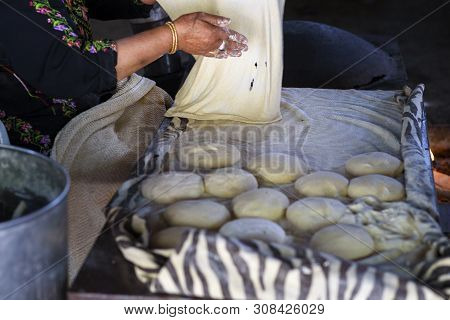 Close Up Of Old Arab Woman Hands Kneading Fresh Dough For Taboon Bread Or Lafah Is A Middle Eastern 