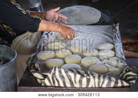 Close Up Of Old Arab Woman Hands Kneading Fresh Dough For Taboon Bread Or Lafah Is A Middle Eastern 