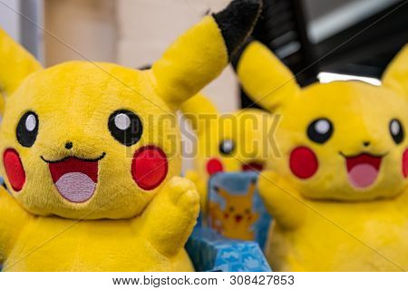 Chester, Uk - 26th June 2019: Groups Of Pikachu Plushes Sit On A Shelf Waiting For Excited Children 