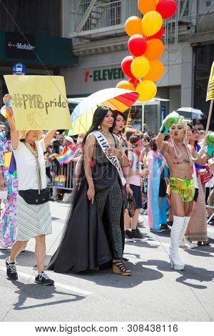 2018 JUNE 24 NEW YORK: NYC Pride March participants from PMBpride on the 5th Ave parade route.