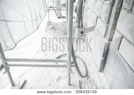 The Gun For Serving A High-pressure Sand Jet. Restoration Of Historical Buildind With Stone Carved D