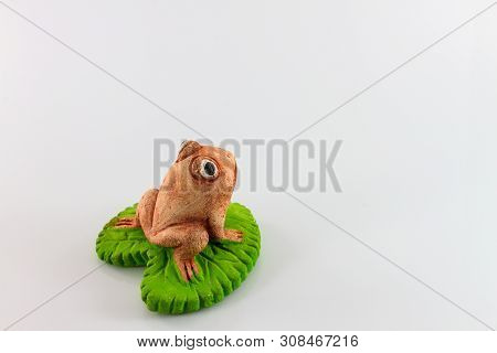 Green Frog Toy On White Background For Decorate Garden