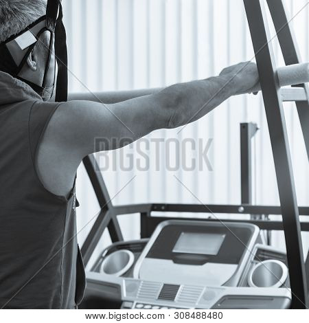 Dnepr, Ukraine- January 3, 2019: Male Patient Doing Test On Treadmill In Modern Clinic Black White I
