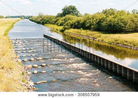 Unesco Biosphere Reserve River Landscape Elbe, Fish Ladder In Creek Sude, Boizenburg, Germany.