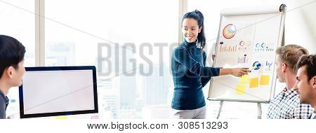 Young Confident Asian Woman Pressenting Financial Statistic Chart In Office Meeting, Banner Backgrou