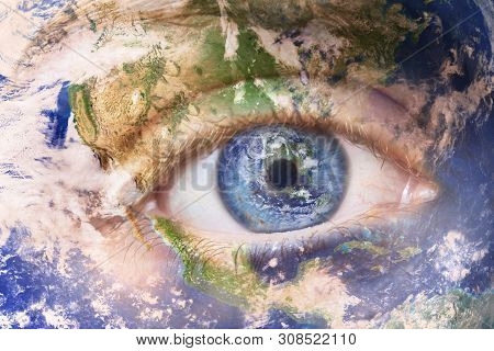 Earth Awakening Concept, Save The Planet. Close Up Image Of Woman Face With Earth Painted. Creative 
