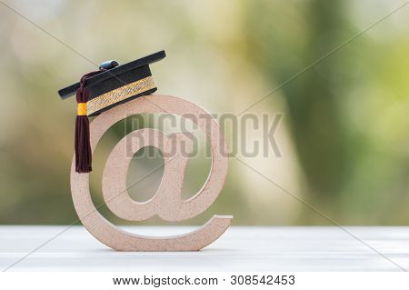 Education University Of Online Learning In Abroad International Concept: Graduation Cap On Lectronic