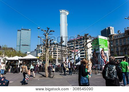 Frankfurt, Germany - May 5: Unidentified People Walk On A Street In Frankfurt, Germany On May 5, 201