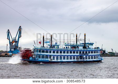 Hamburg, Germany - May 23: Touristic Paddle Steamer Louisiana Star At Hamburg Port On May 23, 2013. 