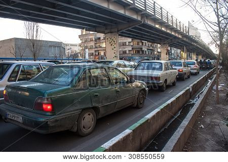 Tehran - February 21: Traffic On A Street On February 21, 2013 In Tehran, Iran. Tehran Is Iranian Ca