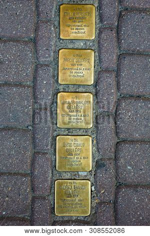 Presov, Slovakia. 09 August 2015. Bronze Plates In Pavement Near The Houses Of People Who Was Deport