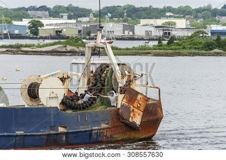 New Bedford, Massachusetts, Usa - June 26, 2019: Fishermen Aboard The Commercial Fishing Vessel Nobs