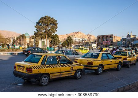 Kerman, Iran - March 1: Taxis Wait For Customers On March 1, 2013 In Kerman, Iran. Population Of Krm