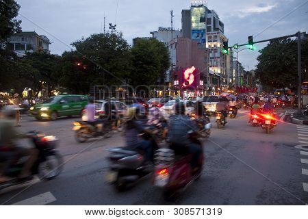 Hanoi - August 7:unidentified Riders Ride Motorbikes On Busy Road On August 7, 2012 In Hanoi, Vietna