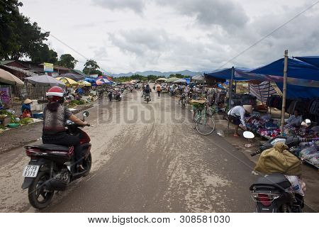 Dien Bien Phu, Vietnam - Aug 13: People Shop At A Market On Aug 13, 2012 In Dien Bien Phu, Vietnam. 