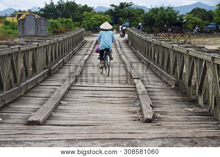 Dien Bien Phu, Vietnam - August 13: Traffic On An Old Bridge On August 13, 2012 In Dien Bien Phu, Vi