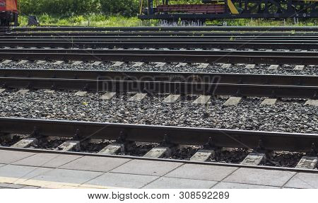 Railway Rails Side View Steel Rails. Transportation By Rail.