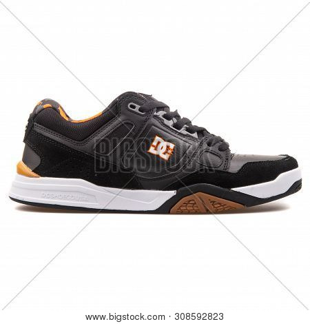 Vienna, Austria - August 25, 2017: Dc Stag 2 Jh Black And Orange Sneaker On White Background.