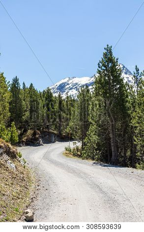 Hydroelectric Site On Alps With Dam And Artificial Lake