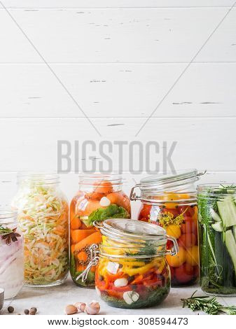 Pickled Vegetables. Salting Various Vegetables In Glass Jars For Long-term Storage. Preserves Vegeta