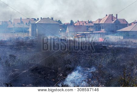 Strong Smoke In Steppe. Forest And Steppe Fires Destroy Fields And Steppes During Severe Droughts. F