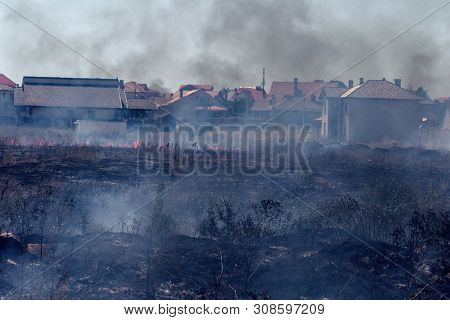 Strong Smoke In Steppe. Forest And Steppe Fires Destroy Fields And Steppes During Severe Droughts. F