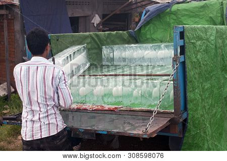 Kampot, Cambodia - July 21: Unidentified Man Transports An Ice On July 21, 2012 In Kampot, Cambodia.
