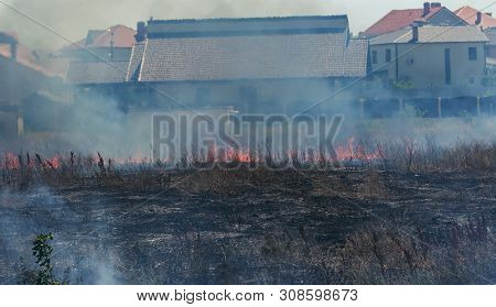 Strong Smoke In Steppe. Forest And Steppe Fires Destroy Fields And Steppes During Severe Droughts. F