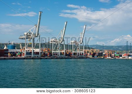 Koper, Slovenia - 24 May 2019: Cranes Line The Quayside Of The Container Port Of Koper In Slovenia