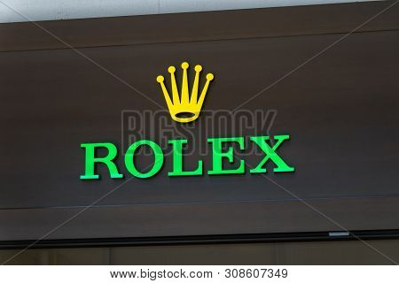 Lugano, Switzerland - June 1, 2019: Logo And Sign Of Rolex Sa. Rolex Is A Swiss Luxury Watch Manufac
