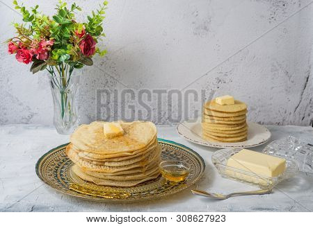 Moroccan Pancakes Baghrir  Beghrir Or Crapes With 1000 Holes Served With Honey And Butter On Grey Ba