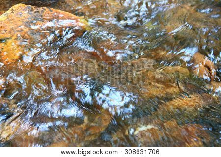 The Smooth And Clear Water Flows Through The Gravel Are Very Cool. Originated From Natural Waterfall