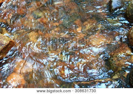 The Smooth And Clear Water Flows Through The Gravel Are Very Cool. Originated From Natural Waterfall