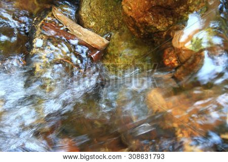 The Smooth And Clear Water Flows Through The Gravel Are Very Cool. Originated From Natural Waterfall
