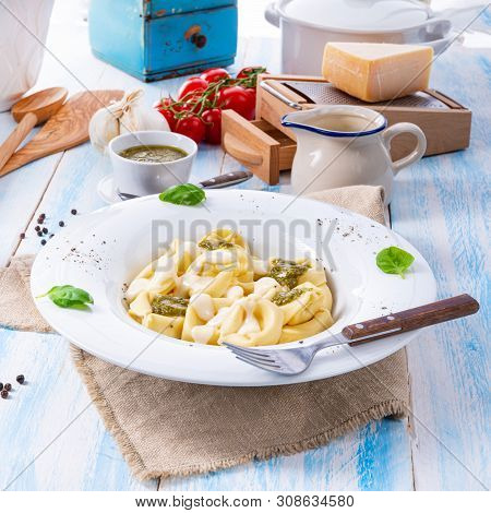 Tortellini Di Formaggio With Basil Pesto And Cheese Sauce