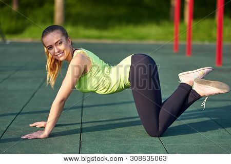 Stretching Fit Or Dancer Woman Doing Exercise In Workout Sports Ground