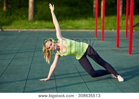 Stretching Fit Or Dancer Woman Doing Exercise In Workout Sports Ground
