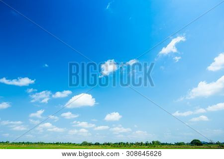 Blue Sky Background Texture With White Clouds.