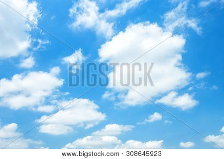 Blue Sky Background Texture With White Clouds.