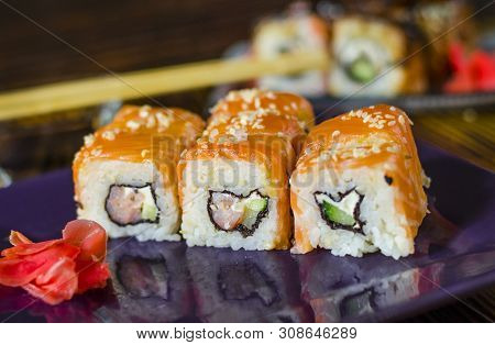 Ushi With Red Fish On A Purple Plate