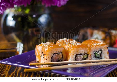 Ushi With Red Fish On A Purple Plate