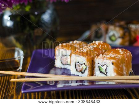 Ushi With Red Fish On A Purple Plate