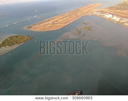 Honolulu - October 25, 2018: Aerial Of Airport Reef Runway, Planes And Plane Hangers At Honolulu Int