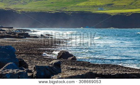 Doolin Bay With Stones And Calm Water With The Cliff In The Background, Beautiful Sunny Spring Day O