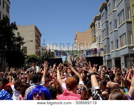 San Francisco - June 25, 2011: People Wae Arms In Air During San Francisco Lovevolution Concert In T