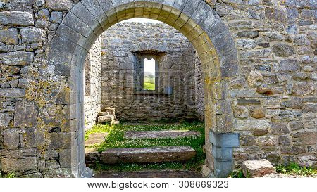Interior View Of The Ruins Of The Medieval Killilagh Church Through A Stone Gate In The Village Of D
