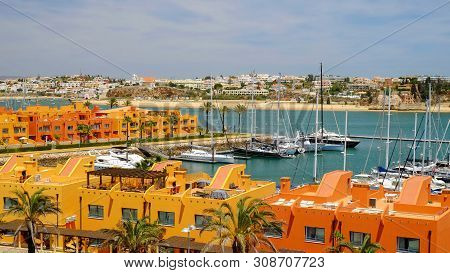 Portimao, Portugal - Mai 24, 2019: View On The Residential Area Of Portimao With Colorful Houses And