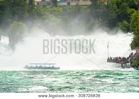Neuhausen Am Rheinfall, Switzerland - 23 July 2019. Waterfall On The River Rhine In The City Neuhaus